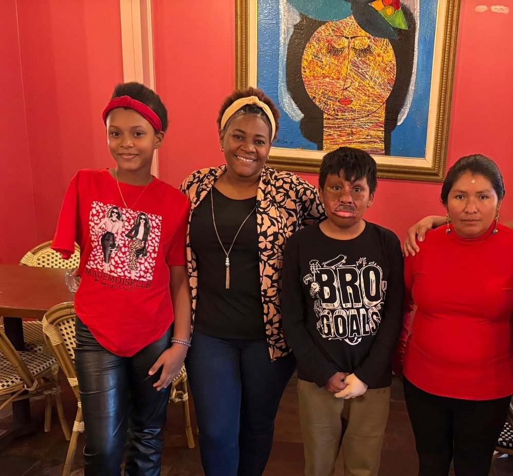 A group of friends and family at a restaurant